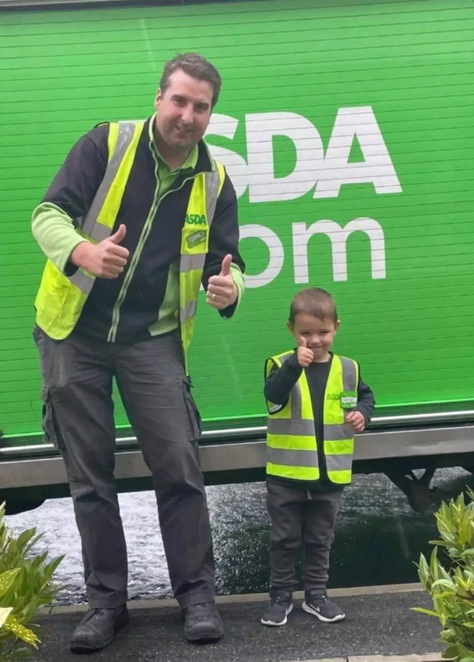 Three-year-old George is a home shopping delivery driver in the making image